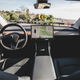 Illustration for article titled The Tesla Model 3 Makes The Future Feel Normal